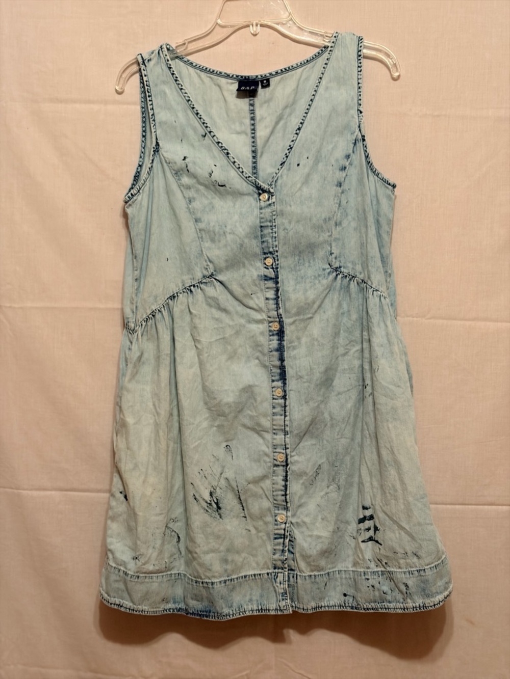 Gap denim dress features a v-neckline, sleeveless straps, button-up front. - Picture 2 of 9